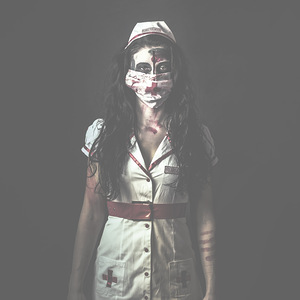 Nightmare nurse standing dead in haunted hospital