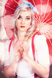 Sexy blonde vintage pinup girl. Field of dreams