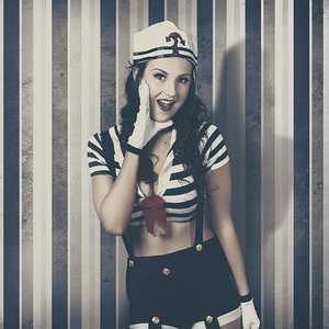 Young retro pinup woman shouting maritime surprise