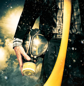 Man with gas mask. New beginning. Sky’s the limit