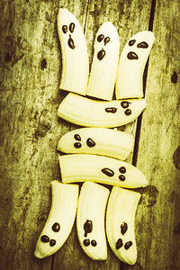 Bananas with painted chocolate faces