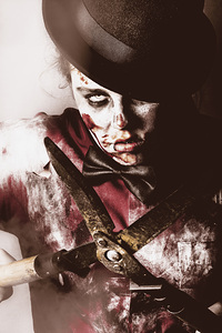 Spooky undead zombie gardener. Midnight pruning