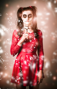 Scary horror voodoo girl with skeleton make-up