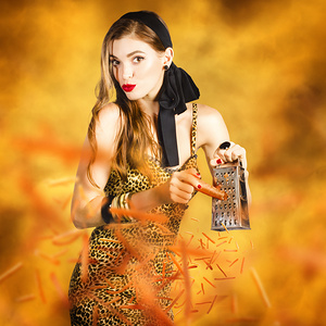 Housewife grating carrots