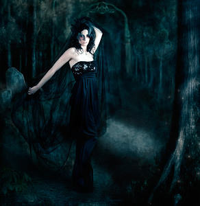 Moody portrait of an elegant mysterious woman