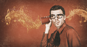 Nerd man listening to live music flow at pub