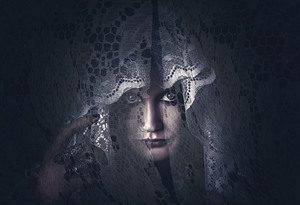 Mysterious female mystic veiled in lace secrecy 