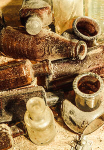 Dust covered medicine bottles