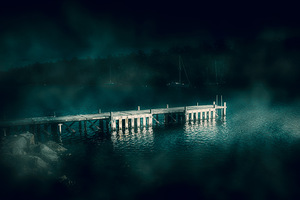 Dark haunting wooden pier