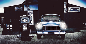 60s Australian FC Holden parked at old garage