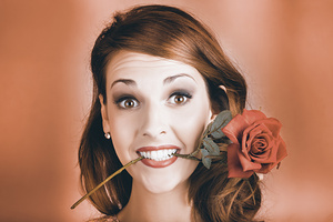 Surprised Young Woman Getting Valentine Flower