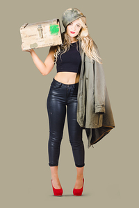 Bombshell blond pinup woman in dangerous style