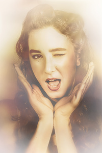 Winking pinup woman with retro hair and makeup