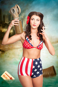 American danger girl. Pinup beauty on toxic beach