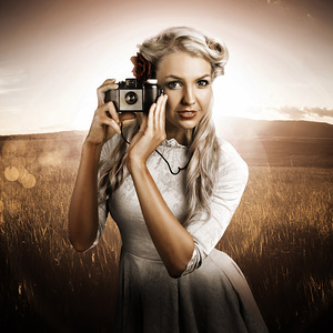 Young Female Photographer With Vintage Camera