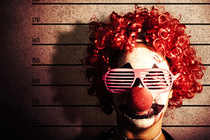 Clown criminal mug shot photo ID on police lines