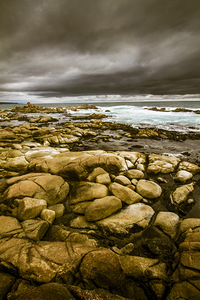 Dark skies on ocean shores