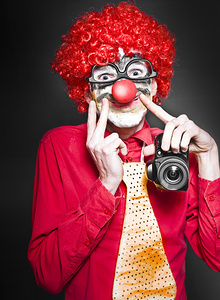 Fun Smiling Clown Holding Camera Taking Happy Snap