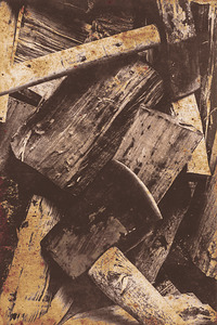 Antique photo of an axe and wood splitter