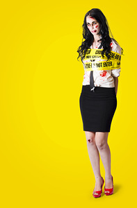 Creepy homicide girl standing undead on yellow