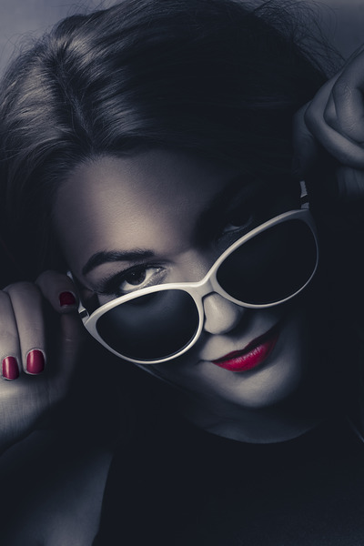 Dark fashion portrait. Female model in sunglasses Print