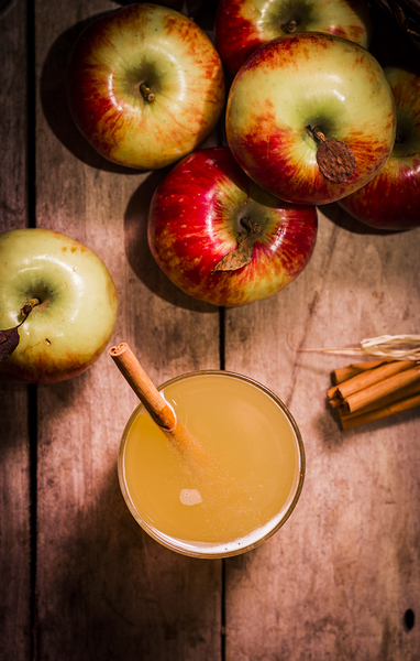 Fresh Apple Cider with Cinnamon Sticks and Apples Print