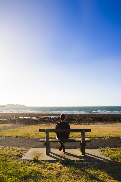 Male tourist enjoying ocean landscape sunset Print