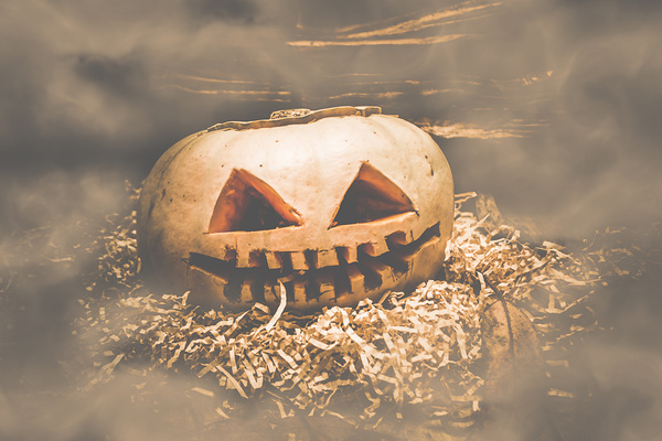 Rustic barn pumpkin head in horror fog Print