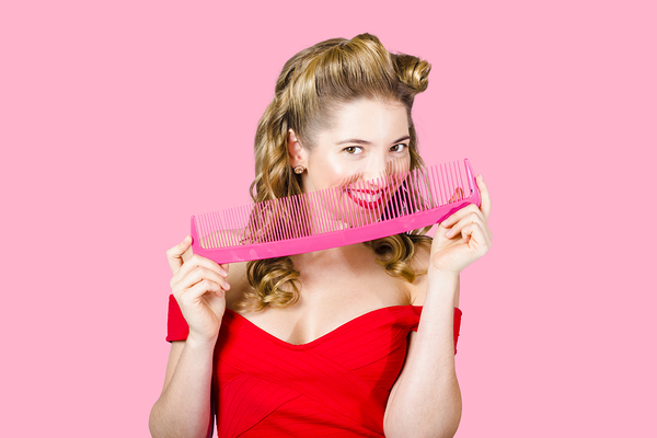 Beauty salon pinup girl smiling with haircare comb Print