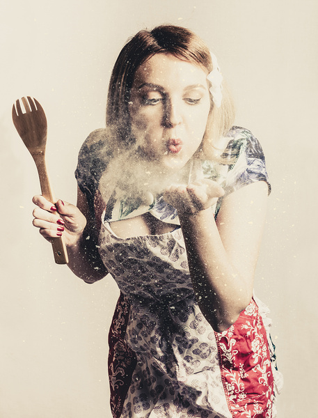 Retro cooking woman giving recipe kiss Print