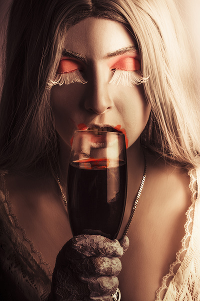 Vampire girl with holding glass of blood Print