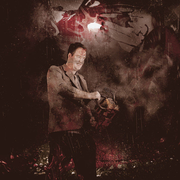 Scary horror man slinging bloody chainsaw in dark Print