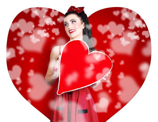 Beautiful woman holding blank love heart sign Print