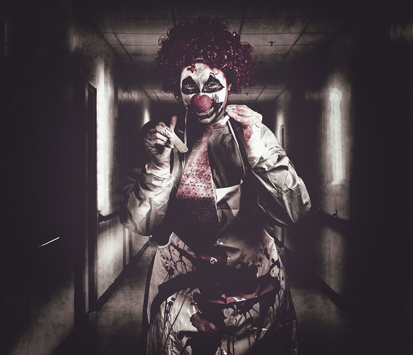 Creepy medical clown in grunge hospital hallway Print