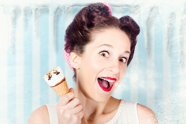 Cool pin-up woman in cold freezer with ice-cream Print