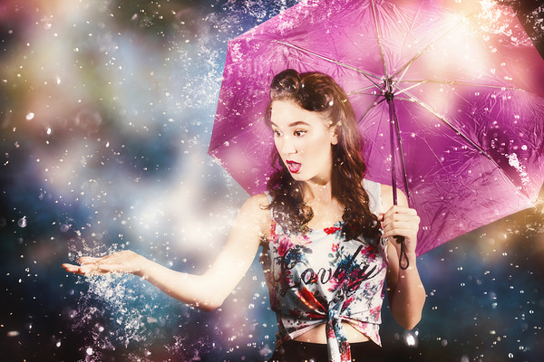 Beautiful pin up woman catching rain water Print