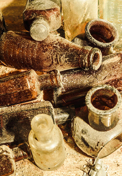 Dust covered medicine bottles Print