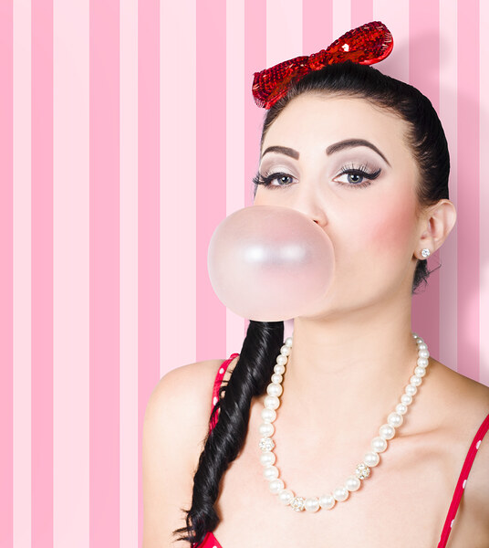 Cute candy store girl blowing chewing gum bubble Print