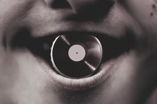 Jukebox DJ holding vinyl soda bottle lid in mouth Print