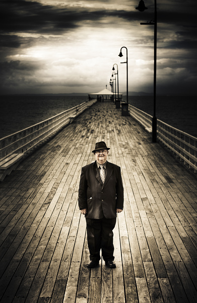 Senior Male Standing On A Pier Promenade Print