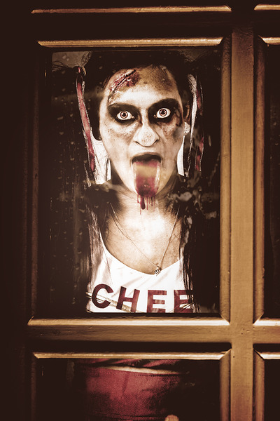 Zombie school girl pulling a funny face on glass Print