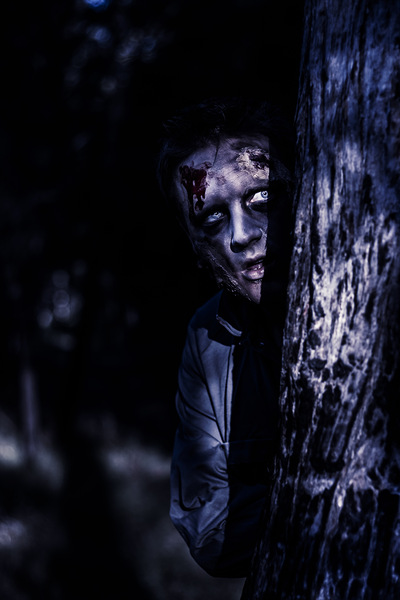 Dark evil zombie watching from horror forest Print