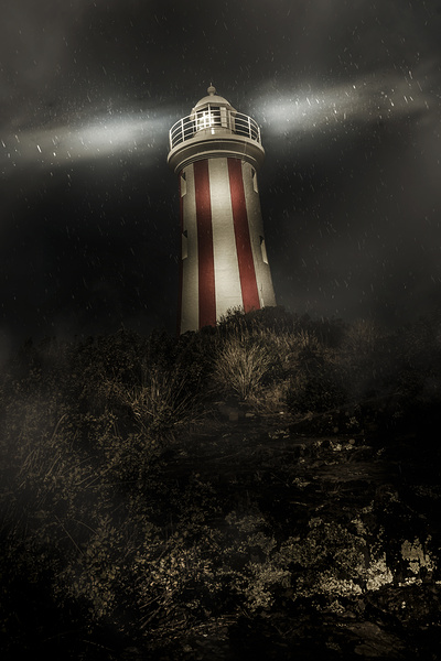 Tasmania lighthouse in rain storm. Guiding light Print