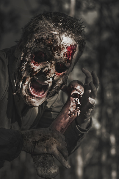 Evil male zombie screaming out in bloody fear Print