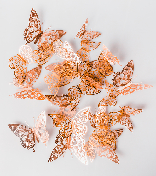 A flurry of peach and gold butterflies Print