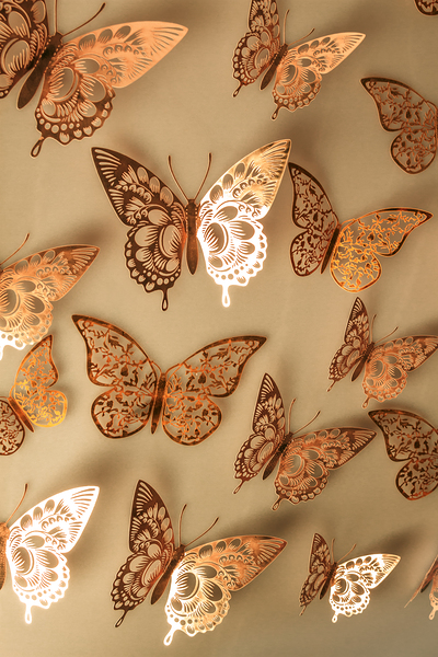 Golden butterflies adorning a soft beige wall Print