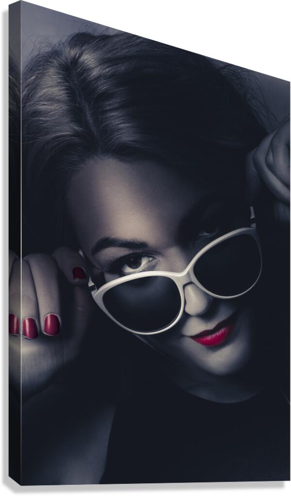 Dark fashion portrait. Female model in sunglasses Canvas Print