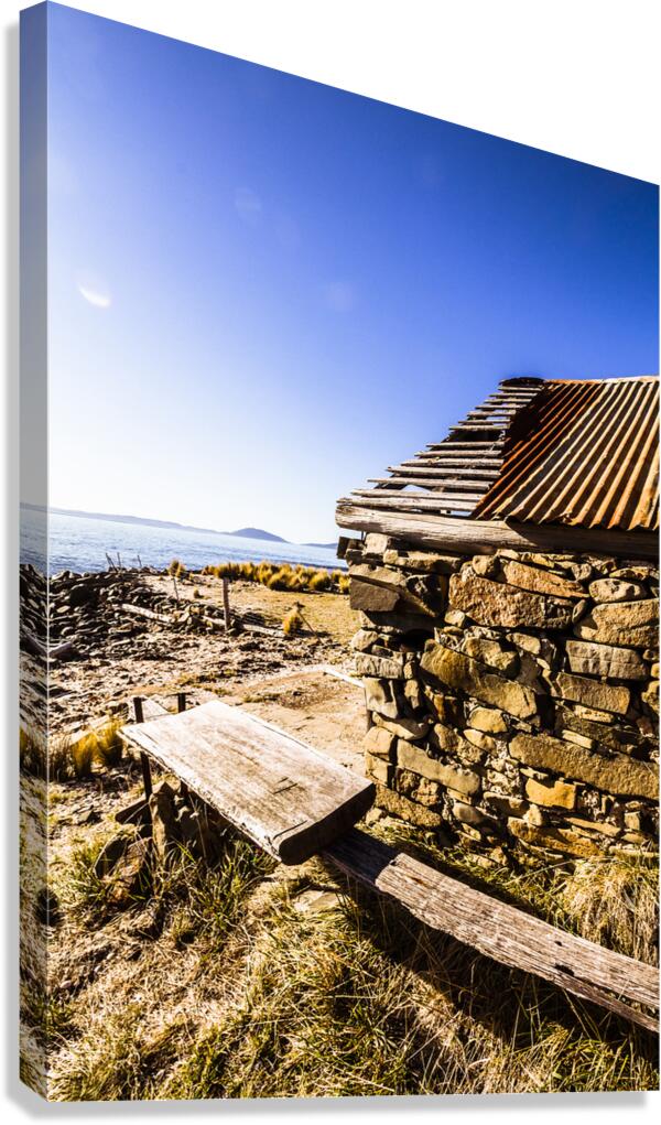Old stone coastal boat house Canvas Print