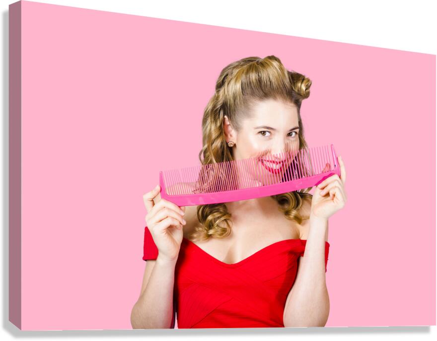 Beauty salon pinup girl smiling with haircare comb Canvas Print