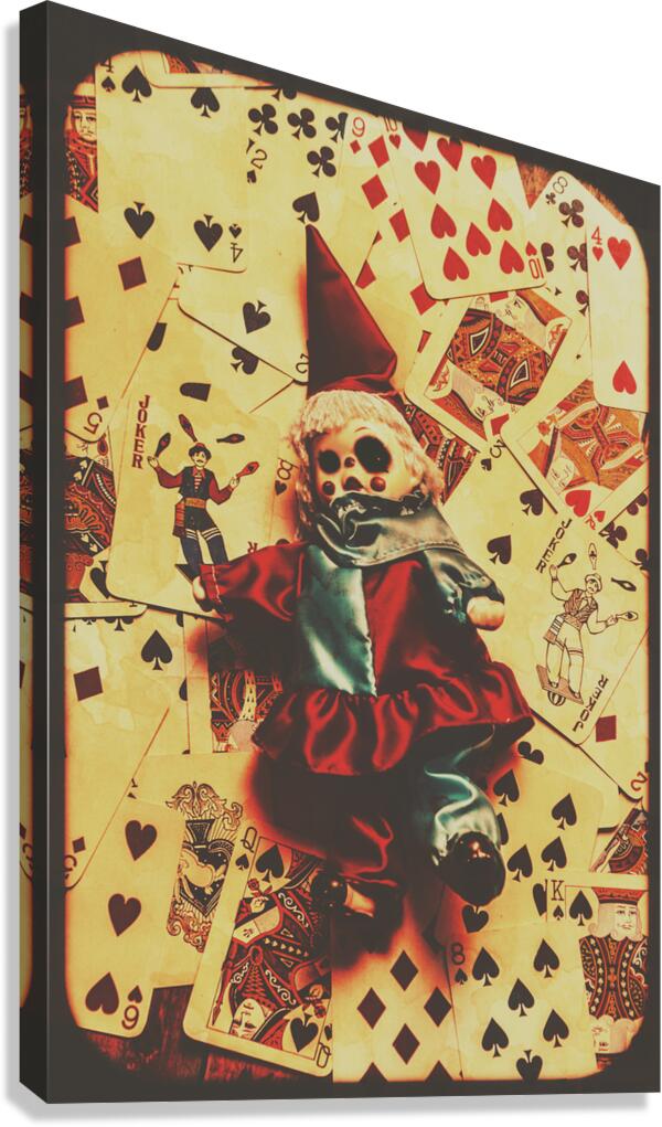 Evil clown doll on playing cards Canvas Print